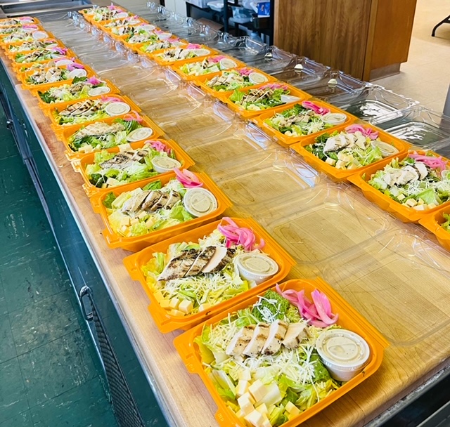 A spread of prepared salads